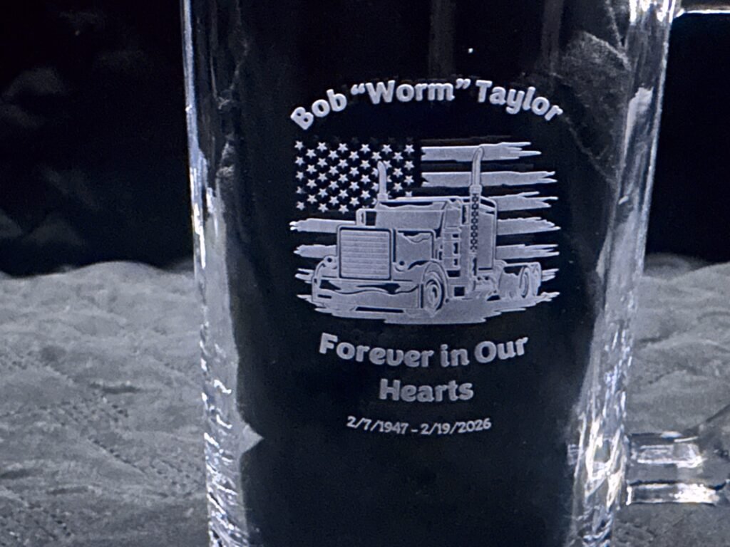 Engraved memorial beer mug, close-up